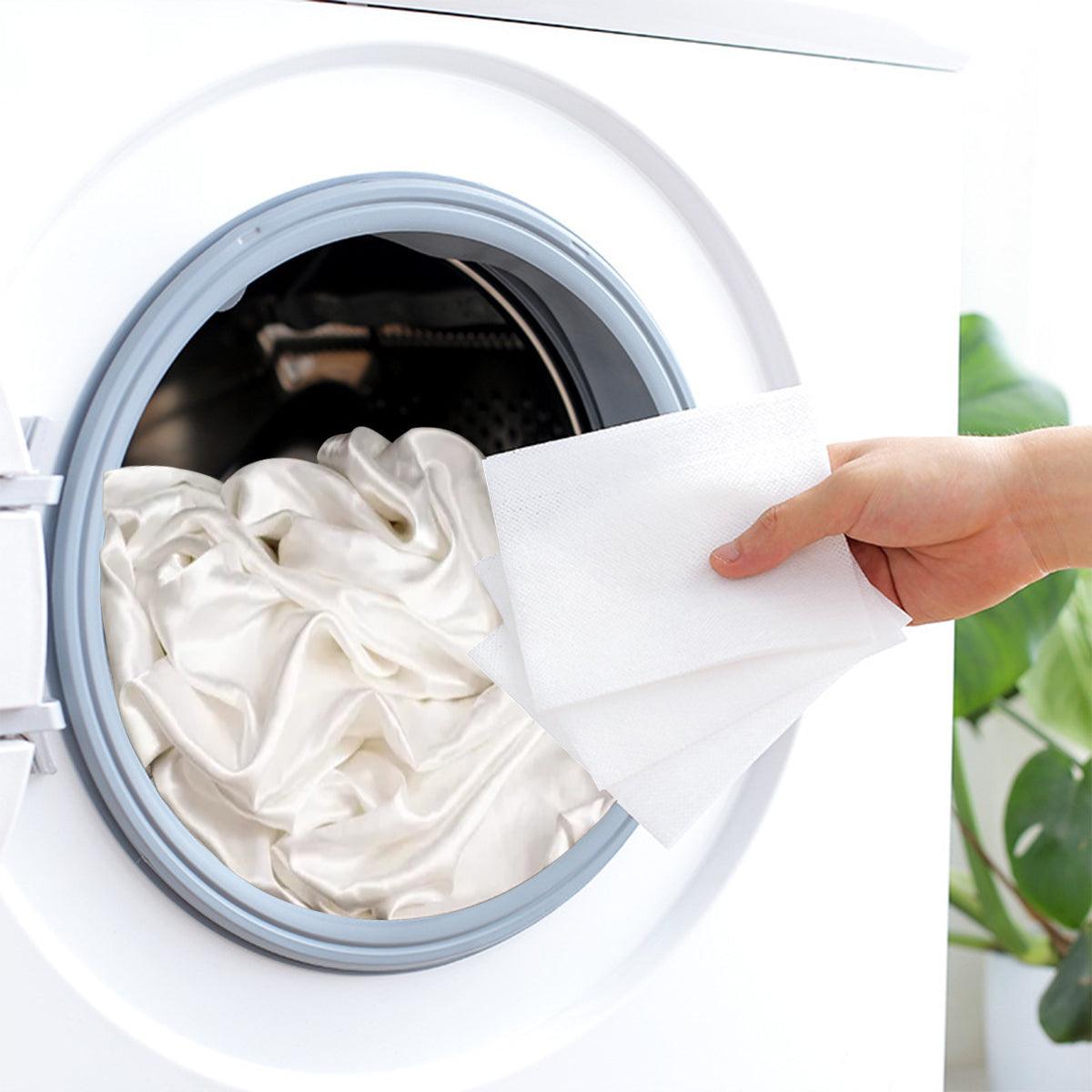 Promeed silk laundry detergent sheets being used in a washing machine for home silk pillowcase care